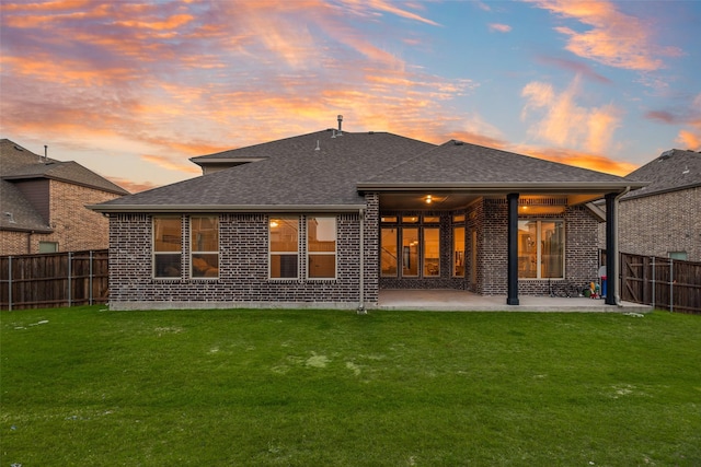 11578 Barcelona Ln, Frisco, TX 75035 - back of house with brick siding, a patio, and roof with shingles
