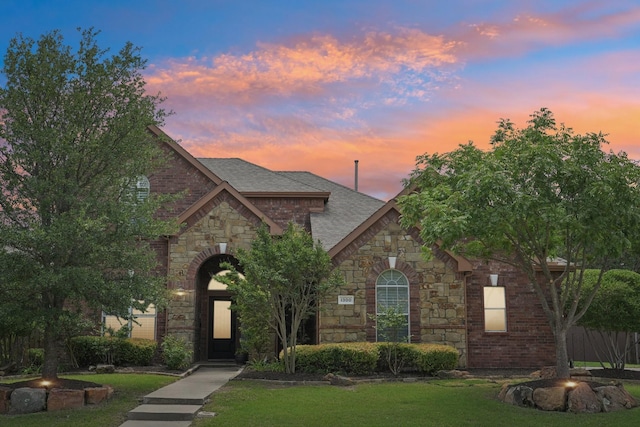 1300 Millers Creek Dr, Prosper, TX 75078 - view of front of house featuring stone siding and roof with shingles