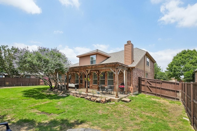 1300 Millers Creek Dr, Prosper, TX 75078 - back of property featuring brick siding, a patio area, a chimney, and roof with shingles