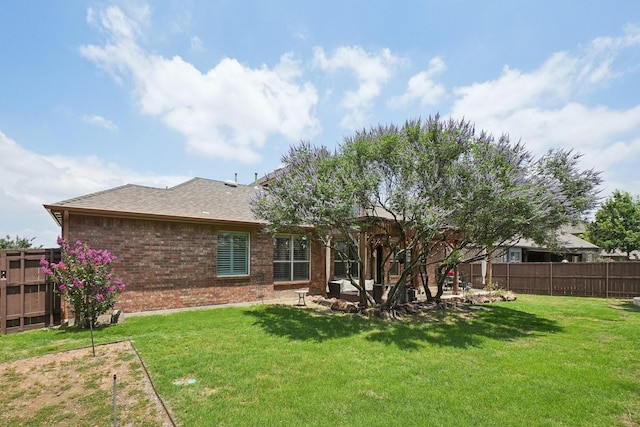1300 Millers Creek Dr, Prosper, TX 75078 - back of property with brick siding and roof with shingles