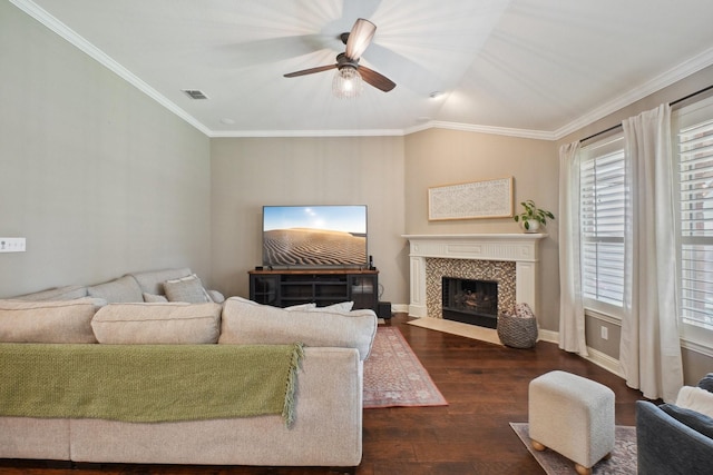 1300 Millers Creek Dr, Prosper, TX 75078 - living room with dark wood-style floors, ceiling fan, ornamental molding, a fireplace, and baseboards