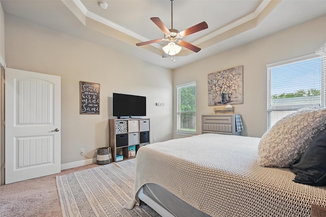 528 England St, Fate, TX 75189 - bedroom featuring a raised ceiling, carpet flooring, ornamental molding, baseboards, and a ceiling fan
