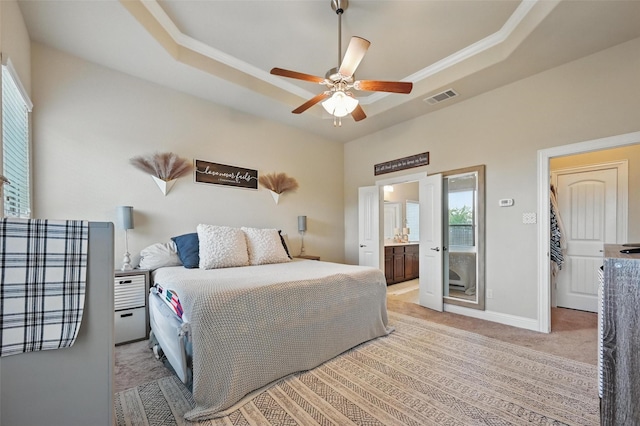 528 England St, Fate, TX 75189 - bedroom featuring multiple windows, a raised ceiling, light colored carpet, and baseboards
