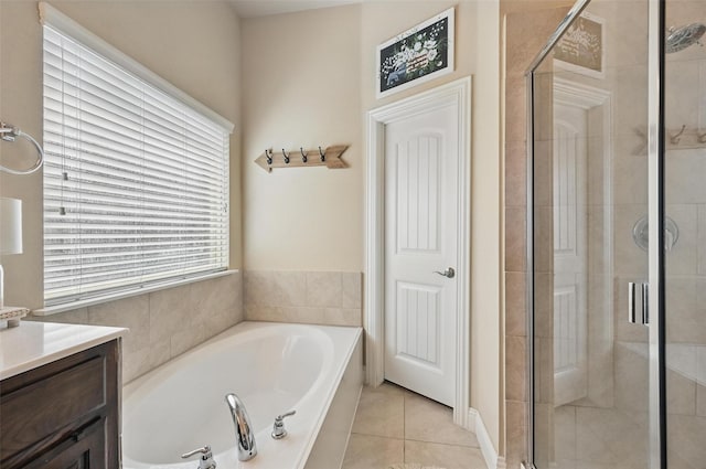 528 England St, Fate, TX 75189 - full bathroom featuring a bath, a shower stall, vanity, and tile patterned floors
