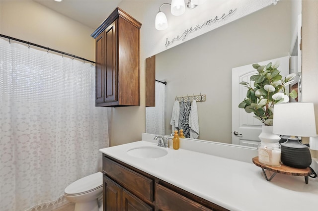 528 England St, Fate, TX 75189 - bathroom with toilet, vanity, and a shower with shower curtain