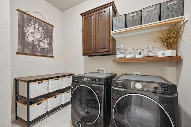 528 England St, Fate, TX 75189 - laundry room featuring washer and clothes dryer, cabinet space, light tile patterned flooring, and baseboards
