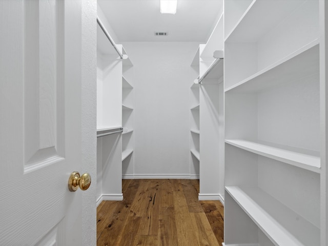 14130 Red Wood Cir S, Frisco, TX 75071 - spacious closet with wood finished floors