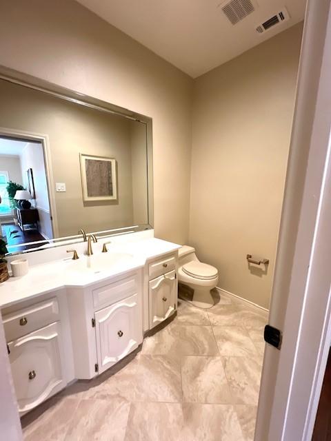 7009 Chevy Chase Ave, Dallas, TX 75225 - bathroom with vanity and toilet