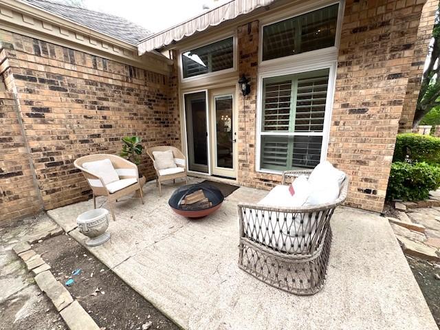 7009 Chevy Chase Ave, Dallas, TX 75225 - view of patio / terrace featuring an outdoor fire pit