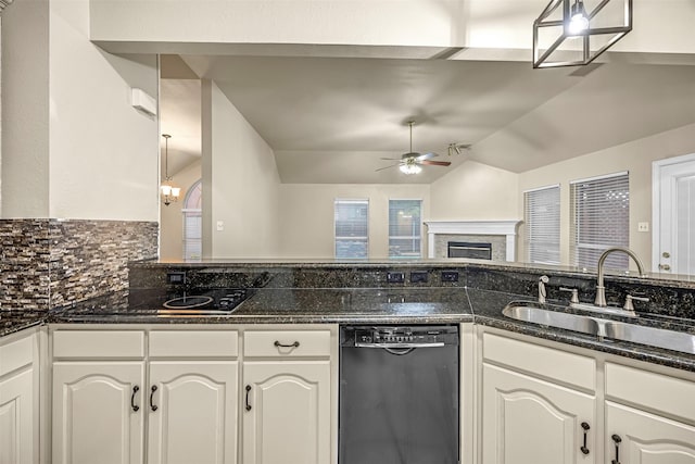 11 Enchanted Ct, Mansfield, TX 76063 - kitchen featuring black appliances, a sink, vaulted ceiling, a ceiling fan, and backsplash