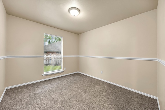 11 Enchanted Ct, Mansfield, TX 76063 - empty room featuring carpet floors and baseboards