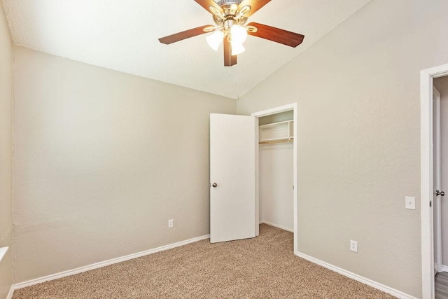 114 Juniper Dr, Arlington, TX 76018 - unfurnished bedroom featuring light colored carpet, baseboards, vaulted ceiling, a closet, and ceiling fan