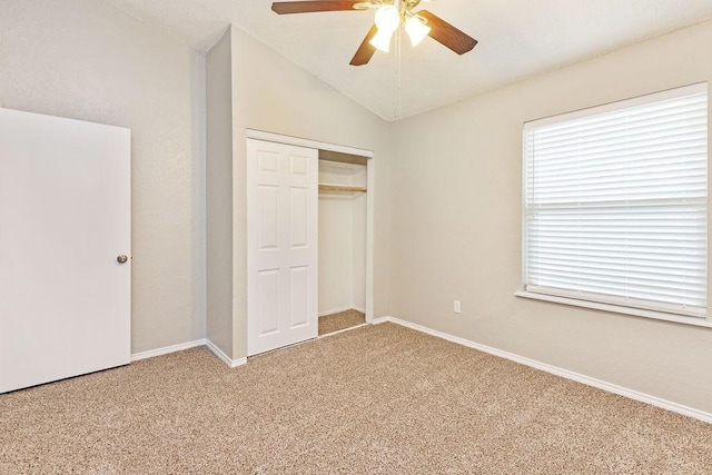 114 Juniper Dr, Arlington, TX 76018 - unfurnished bedroom featuring light colored carpet, lofted ceiling, a closet, baseboards, and a ceiling fan