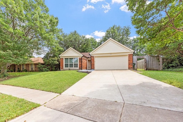 114 Juniper Dr, Arlington, TX 76018 - view of front of house with brick siding, driveway, and an attached garage