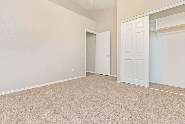114 Juniper Dr, Arlington, TX 76018 - unfurnished bedroom featuring carpet floors, a closet, and baseboards