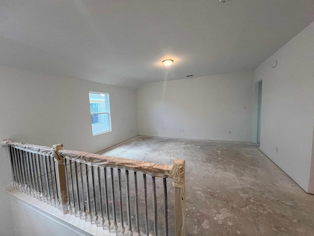 713 Roanoke, Princeton, TX 75407 - spare room featuring concrete floors