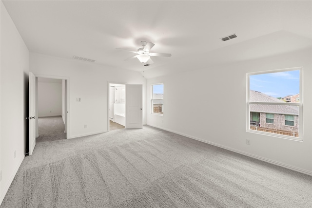 713 Roanoke, Princeton, TX 75407 - unfurnished bedroom with carpet floors, a ceiling fan, and ensuite bath