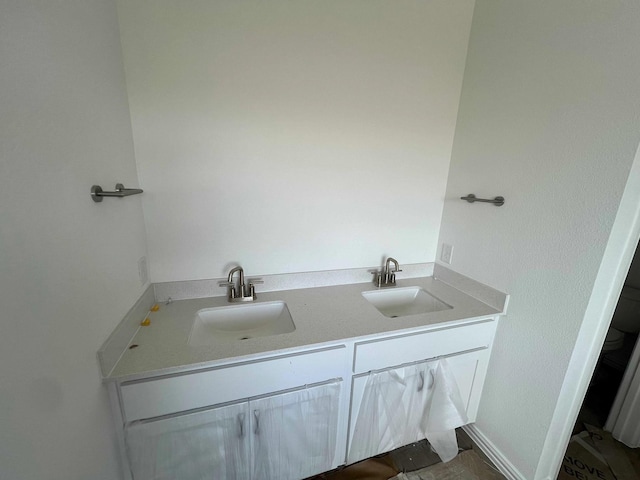 713 Roanoke, Princeton, TX 75407 - bathroom featuring double vanity and toilet