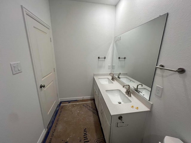 713 Roanoke, Princeton, TX 75407 - bathroom with double vanity and baseboards