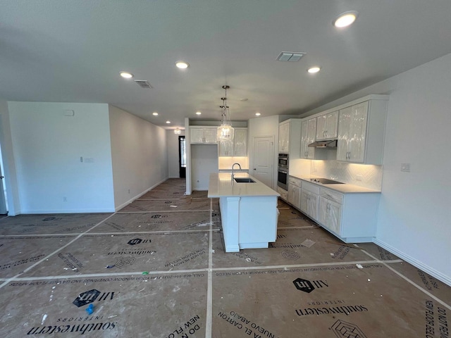 713 Roanoke, Princeton, TX 75407 - kitchen with a sink, black electric cooktop, recessed lighting, tasteful backsplash, and white cabinets