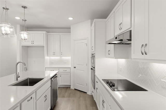 713 Roanoke, Princeton, TX 75407 - kitchen featuring black electric cooktop, under cabinet range hood, stainless steel dishwasher, recessed lighting, and white cabinetry