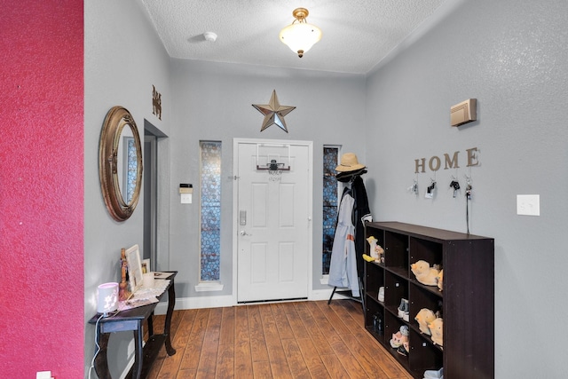 1623 Bertram Dr, Mansfield, TX 76063 - entryway with hardwood / wood-style flooring and a textured ceiling