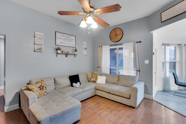 1623 Bertram Dr, Mansfield, TX 76063 - living room with ceiling fan, baseboards, and wood finished floors