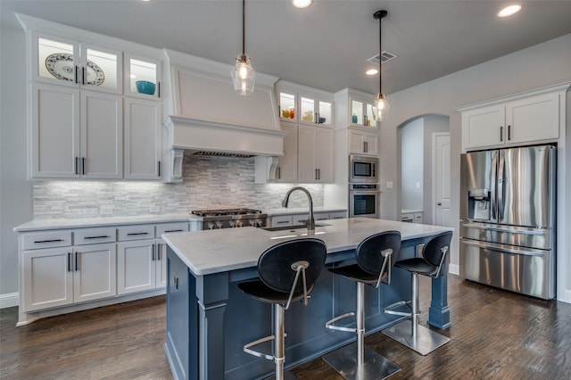 15186 Crape Myrtle Rd, Frisco, TX 75035 - kitchen featuring appliances with stainless steel finishes, a sink, light countertops, white cabinets, and recessed lighting