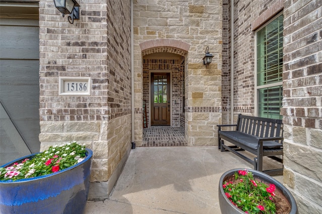 15186 Crape Myrtle Rd, Frisco, TX 75035 - doorway to property with brick siding