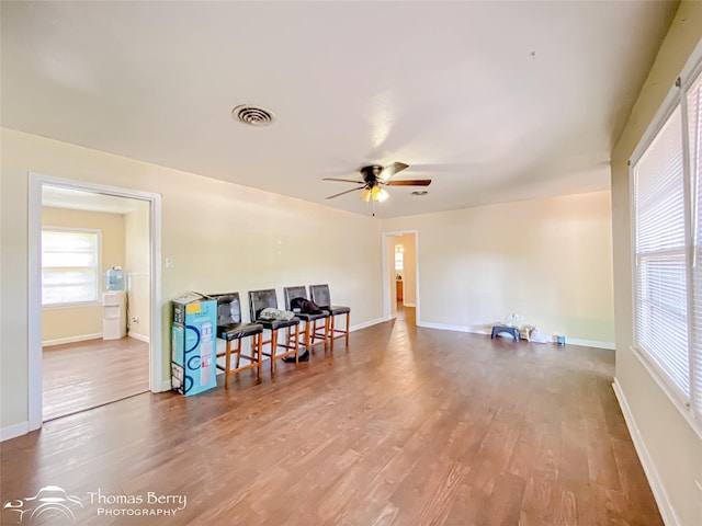 3816 State St, Abilene, TX 79603 - living area featuring a ceiling fan, wood finished floors, and baseboards