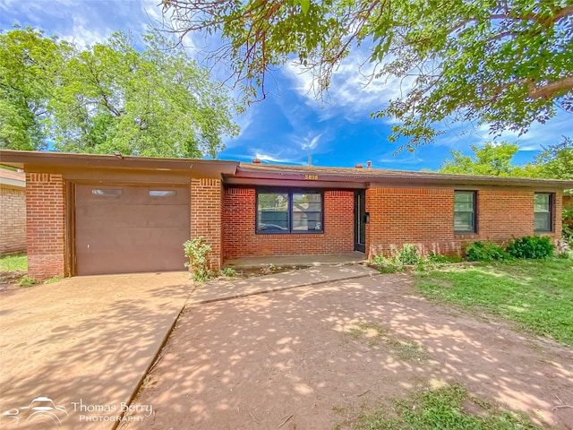 3816 State St, Abilene, TX 79603 - single story home with brick siding, a garage, and driveway