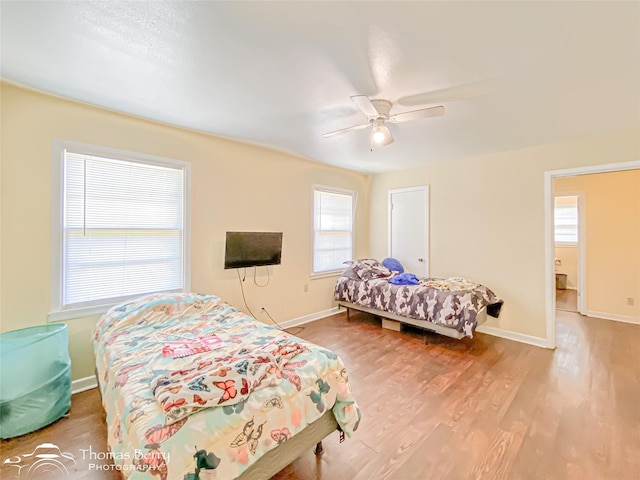 3816 State St, Abilene, TX 79603 - bedroom with wood finished floors, baseboards, and ceiling fan