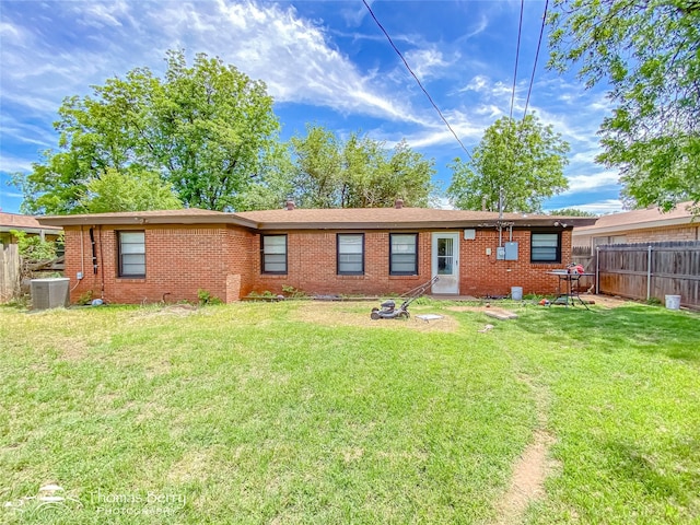 3816 State St, Abilene, TX 79603 - back of house featuring central AC unit and brick siding