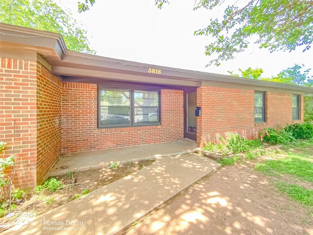 3816 State St, Abilene, TX 79603 - doorway to property with brick siding