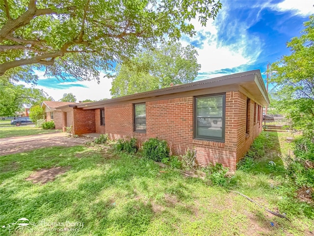 3816 State St, Abilene, TX 79603 - view of side of home with brick siding