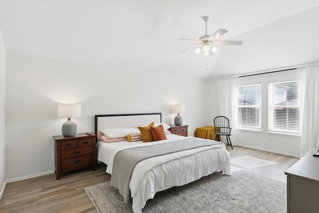 216 Hilltop Dr, Justin, TX 76247 - bedroom featuring light wood-style flooring, baseboards, vaulted ceiling, and ceiling fan