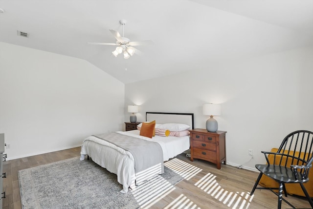 216 Hilltop Dr, Justin, TX 76247 - bedroom featuring lofted ceiling, wood finished floors, a ceiling fan, and baseboards