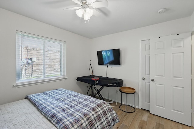 216 Hilltop Dr, Justin, TX 76247 - bedroom featuring light wood-style floors and a ceiling fan