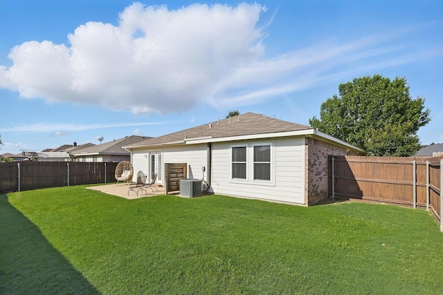 216 Hilltop Dr, Justin, TX 76247 - back of house featuring a patio area, brick siding, and cooling unit