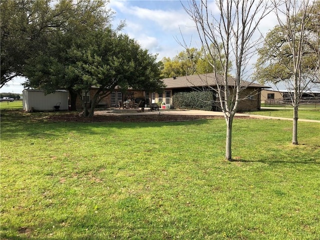 1019 Springhill Rd, Aubrey, TX 76227 - view of grassy yard featuring a patio