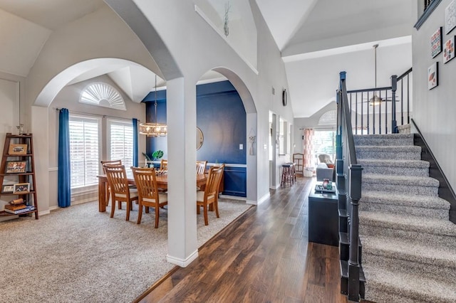 8320 Monica Cir, Plano, TX 75025 - entrance foyer featuring plenty of natural light, stairs, baseboards, dark wood finished floors, and high vaulted ceiling