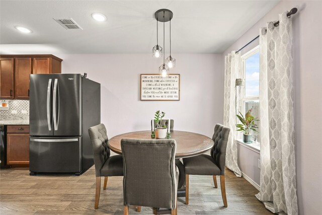 9104 Lookout Pt, Fort Worth, TX 76179 - dining area with wood finished floors, recessed lighting, and baseboards