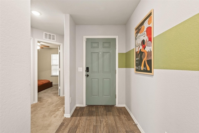 9104 Lookout Pt, Fort Worth, TX 76179 - doorway with wood finished floors, baseboards, a textured wall, and ceiling fan