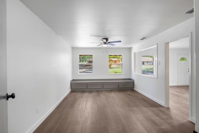 1538 N Hill Ave, Tyler, TX 75702 - spare room featuring ceiling fan, wood finished floors, and baseboards