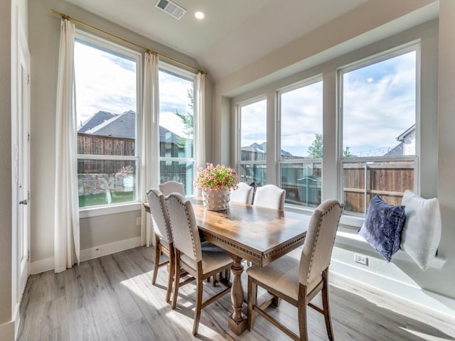2724 Eccleston St, Celina, TX 75009 - dining area with light wood finished floors, baseboards, recessed lighting, and vaulted ceiling
