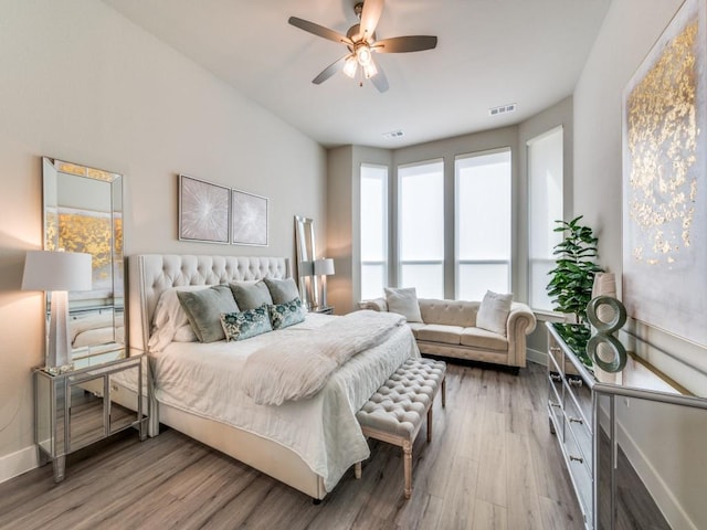 2724 Eccleston St, Celina, TX 75009 - bedroom with wood finished floors, baseboards, and a ceiling fan