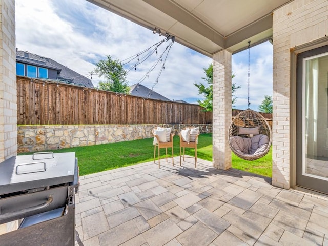 2724 Eccleston St, Celina, TX 75009 - fenced backyard with a patio area and a grill