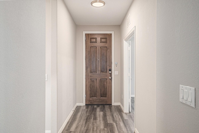 2535 Candle Ln, Northlake, TX 76247 - doorway to outside featuring dark wood-type flooring and baseboards