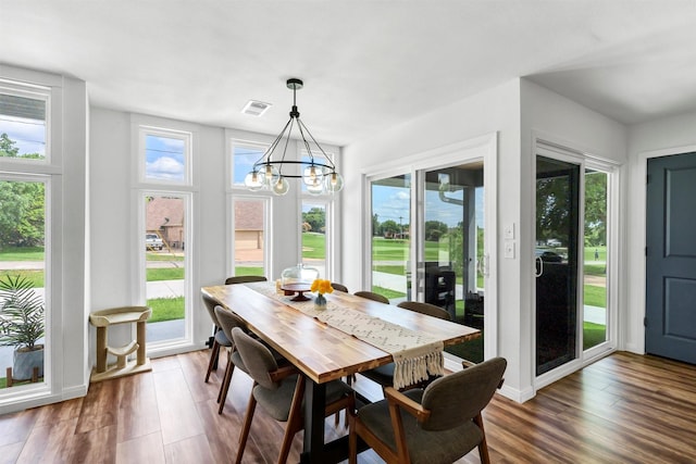 4902 Boquillas Dr, De Cordova, TX 76049 - dining space featuring a chandelier and wood finished floors