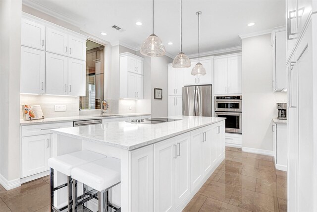 5840 Wavertree Ln, Plano, TX 75093 - kitchen featuring a center island, appliances with stainless steel finishes, tasteful backsplash, baseboards, and recessed lighting